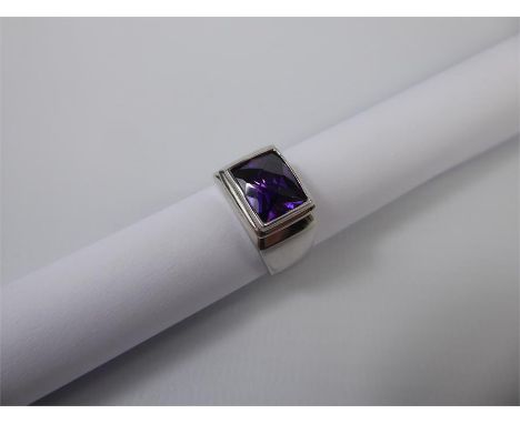 A Lady's Silver and Multi-Faceted Cut Amethyst Ring, size P, approx 8.3 gms