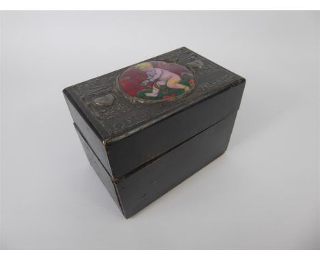 A Vintage Wooden Playing Card Box, with metal top inscribed 'The Knave of Hearts', contains playing cards from Ian Shrager Ho