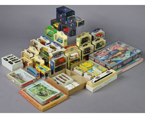 A Monopoly “Bath Edition” board game, as-new; four various jigsaw puzzles; &amp; approximately thirty-various scale model veh