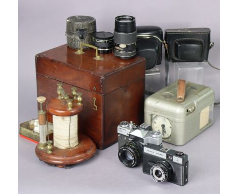 A Zenith “EM” camera; an Omo “Cosmic Symbol” camera; two camera lenses; &amp; two scientific instruments. 