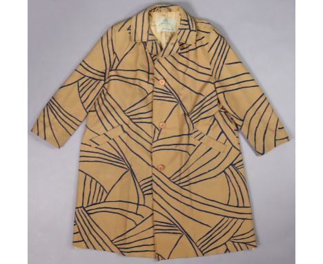 A vintage Aquascutum of Regent Street London ladies trench coat of light brown ground &amp; with all-over repeating navy blue