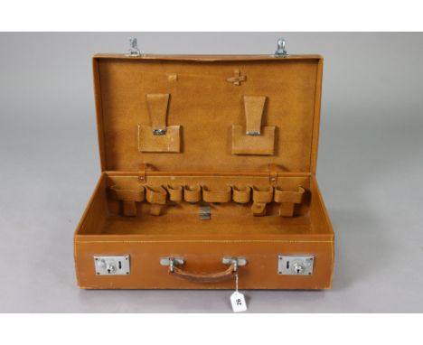 A vintage tan leather vanity case fitted chrome twin-lever locks, 61cm wide.