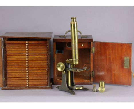 A Late 19th century mahogany microscope cabinet fitted nineteen long drawers enclosed by a Perspex door, 21cm wide x 23cm hig