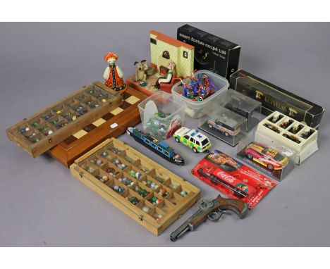 A modern carved wooden chess set, with case; various die-cast scale model vehicles; &amp; various other toys. 