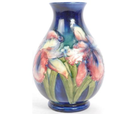 Moorcroft Pottery - Vintage 20th century ceramic vase. In the orchid design. With floral pattern design on a blue ground. Sig