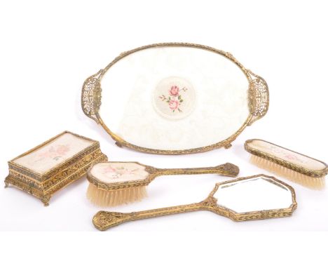 A vintage 20th century circa. 1930's dressing table vanity set. Each piece&nbsp;having glazed needlepoint of roses to top on 