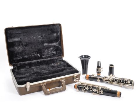 A vintage American made Buescher 'Aristocrat' clarinet in plush lined hard case.&nbsp;