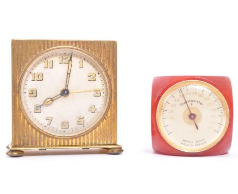 A vintage mid 20th century French Rolux Bakelite thermometer in the form of a dice. Accompanied by a miniature 1950's desk to