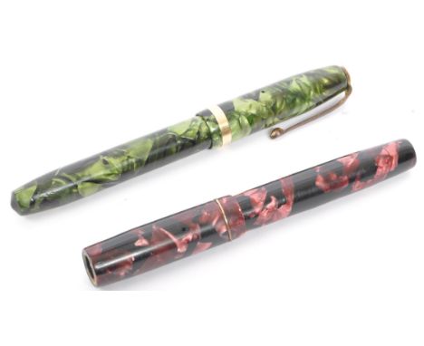 A pair of vintage 20th century circa. 1940's lucite fountain pens. To include a green example with maker mark and 14ct gold n