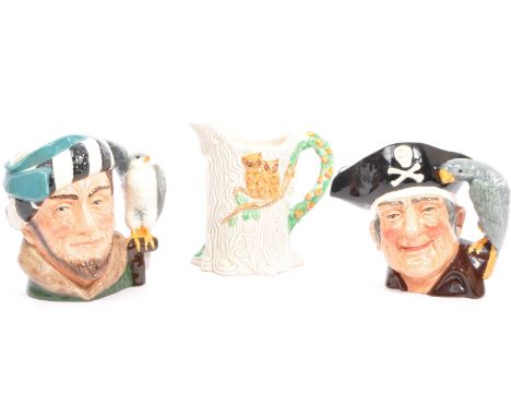 An assortment of three vintage 20th century Royal Doulton toby jugs, comprising of The Falconer D 6533, Long John Silver D 63