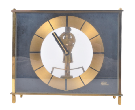 Kundo - A retro vintage mid 20th century gilt metal and glass desk clock / mantel clock. Central dial with swinging partial e