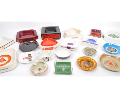 A large collection of vintage mainly ceramic, with some glass advertising / promotional pub alcohol and smoking ashtrays to i