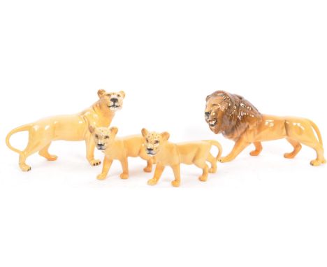 A collection of vintage 20th century Beswick ceramic figurines. Comprising of Lion, Lioness and a pair of Lion cubs. All in a