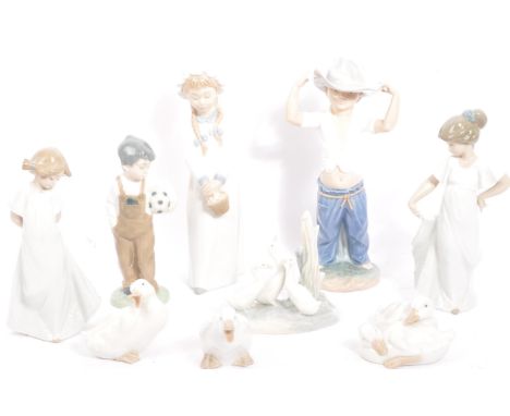 Nao for Lladro - A collection of six vintage 20th century Spanish porcelain to include How Pretty!, Boy With Football, Girl W