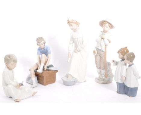 Nao for Llladro - A collection of five vintage 20th century Spanish porcelain figurines to include Choir Boys and Boy With Do