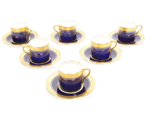 A set of six Aynsley bone china coffee cups and saucers, with gold gilding scrollwork to cup edge and saucer edge. Fully case