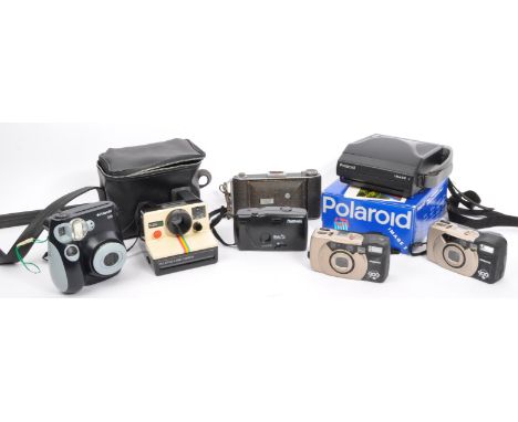 A collection of vintage 20th century Polaroid camera equipment. The lot to include a Polaroid Camera 2 Instant Camera, a Pola