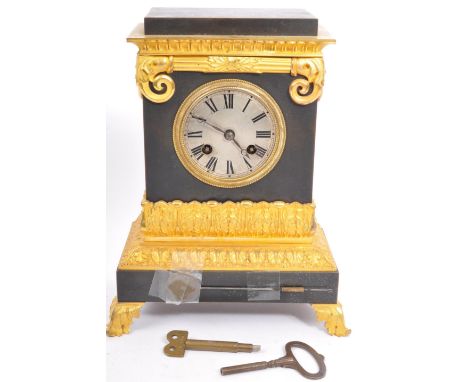 A vintage 20th century slate 8 day mantel clock. With stepped rectangular top with gilt scrolled decoration repeating foliate