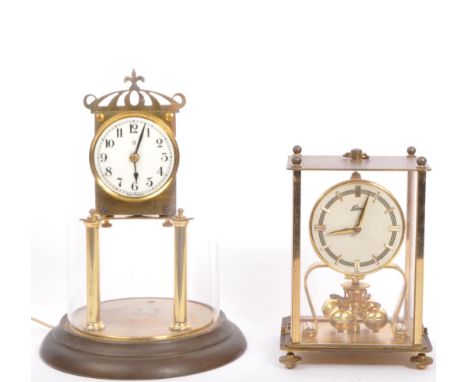 A pair of vintage 20th century anniversary clocks to include a German example in glazed square case and another early 20th ce
