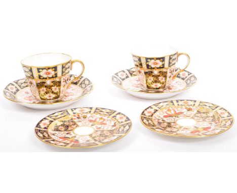 Royal Crown Derby - English bone china porcelain. Imari pattern cups and saucers. 2451 pattern number. In gilt and floral pai