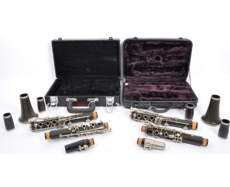 Two vintage English Odyssey clarinets in hard cases. The lot to include a Odyssey (two barrels) together with another Odyssey