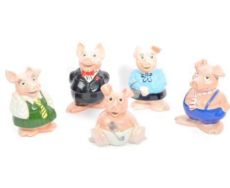 A collection of five vintage, late 20th century, Natwest ceramic pig money banks / piggy banks by WADE, England. All with ori