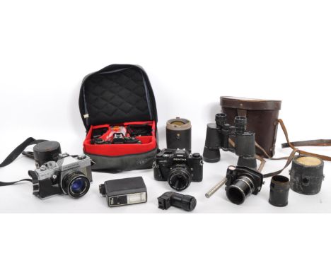 A collection of retro vintage 20th century cameras &amp; camera equipment. The lot to include a Praktica MTL3 camera, a Penta