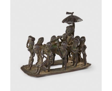AKAN PROCESSIONAL SCENE GHANA cast bronze, a processional scene, a high ranking figure is bourne in a litter carried by six a