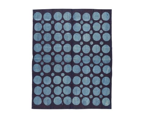 YORUBA ADIRE TEXTILE   NIGERIA dyed cotton, with rows of light blue circles on a navy ground(204cm x 173cm)Footnote: Provenan