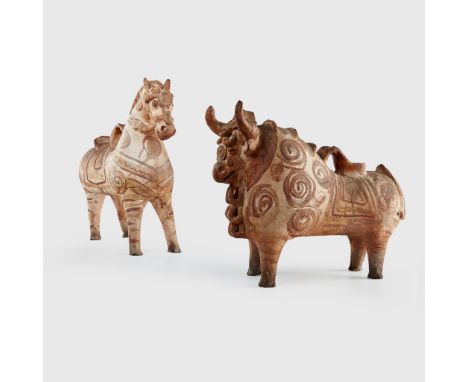 PAIR OF PUCARA POTTERY FIGURES PERU painted terracotta, both hollow, the first in the form of a strongly built bull, with con