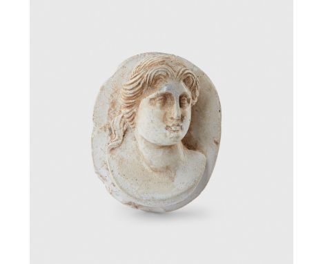 ROMAN CAMEO PORTRAIT BUST OF A FEMALE EUROPE OR NEAR EAST, 1ST - 2ND CENTURY A.D. pottery, raised from an oval base, the fema