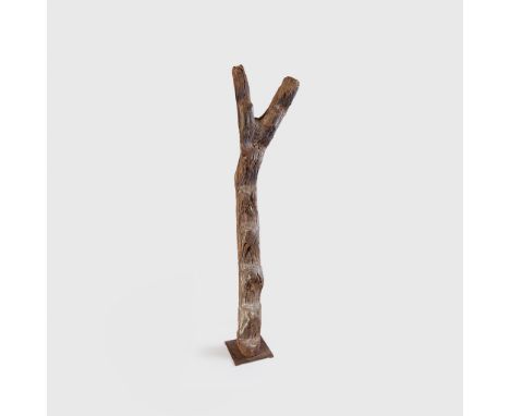 DOGON LADDER MALI wood, carved from a single trunk, with six treads, presented on an iron base(148cm tall)Footnote: Provenanc
