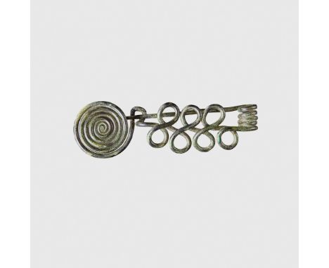 BRONZE AGE COILED BROOCH CENTRAL EUROPE, C. 11TH - 10TH CENTURY B.C. copper alloy, in the form of three figure of eight coils