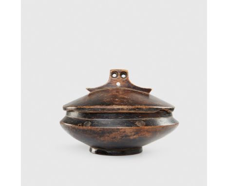 LOZI BOWL ZAMBIA standing on a circular base, with deep bowl and independent lid with architectural finial(20.2cm diameter)Fo