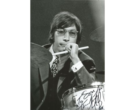 Charlie Watts signed and dedicated 10x8 black and white image. Charlie Watts was most famous for being the drummer for the gr