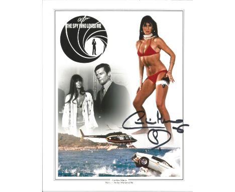 Caroline Munro signed 10x8 colour image taken from her role on James Bond's The Spy Who Loves Me'.  Good condition. All autog