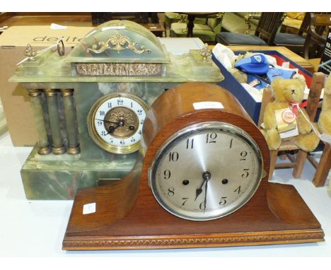 An early-20th century green onyx striking mantel clock of architectural form, the movement stamped 'Jules Rolez Limited', 31c