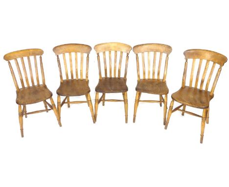 A set of five Victorian oak and beech Windsor chairs, shaped rail above four slat back, the styles with ball finial decoratio