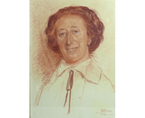 Otto Neumann (Scandinavian, 1888-1944): Portrait of a smiling lady, red chalk on paper, signed and dated 'Skagen 1933' lower 