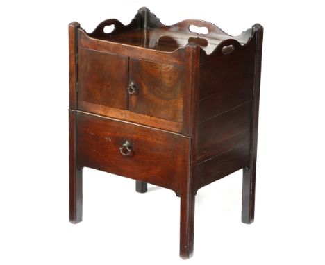 A GEORGE III MAHOGANY TRAY-TOP BEDSIDE COMMODE LATE 18TH CENTURY the galleried top pierced with handgrips, above a pair of cu