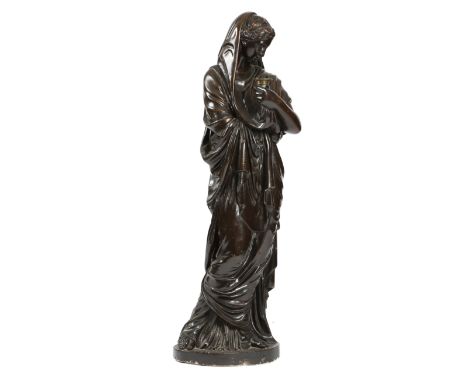 A BRONZED PLASTER FIGURAL TORCHERE IN THE MANNER OF HUMPHREY HOPPER 19TH CENTURY in the form of a classical maiden holding a 
