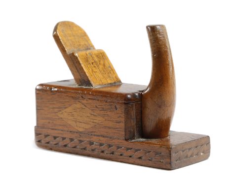 A TREEN CARPENTER'S PLANE SECRET SNUFF BOX POSSIBLY FRENCH, 19TH CENTURY with carved and lozenge decoration 9.4cm wide PROVEN