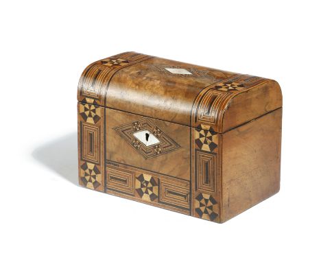 A VICTORIAN WALNUT AND PARQUETRY TEA CADDY inlaid with mother of pearl lozenges, the domed lid revealing a twin lidded interi