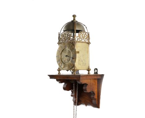 A BRASS LANTERN CLOCK BY JOHN BUFFETT OF COLCHESTER EARLY 18TH CENTURY the thirty hour birdcage movement striking on a bell, 