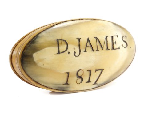 A REGENCY HORN OVAL SNUFF BOX PROBABLY WELSH, EARLY 19TH CENTURY the lid inscribed and dated 'D. James 1817' 9cm wide PROVENA