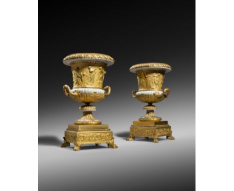 A PAIR OF FINE AND RARE FRENCH LOUIS XVI ORMOLU MOUNTED WHITE MARBLE VASES AFTER THE BORGHESE VASE c.1790 each elliptical and