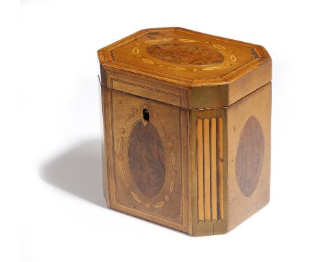 A GEORGE III SYCAMORE AND MARQUETRY TEA CADDY LATE 18TH CENTURY iof canted rectangular form, inlaid with stringing, with oval