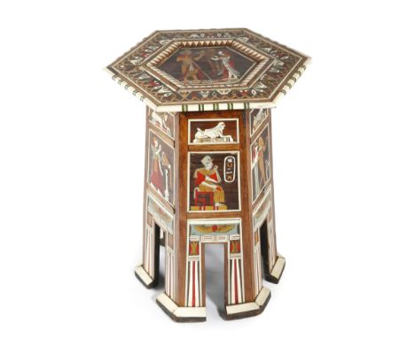 A SMALL MOORISH WALNUT EGYPTIAN REVIVAL TABLE OR STAND EARLY 20TH CENTURY inlaid with bone and mother of pearl, the hexagonal