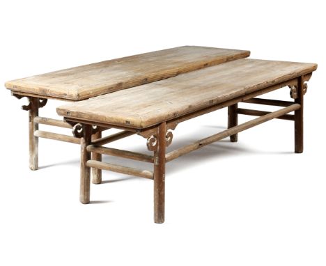 A PAIR OF CHINESE PINE BENCHES 19TH CENTURY with scroll decoration and turned stretchers (2) 56cm high, 198cm wide, 55cm deep
