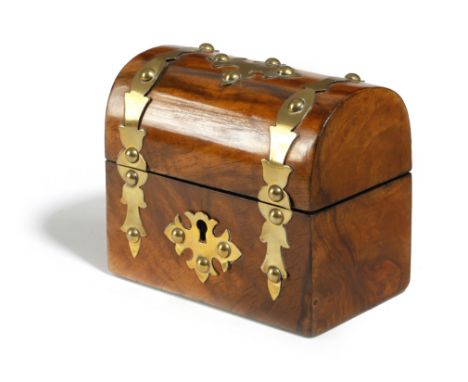 A SMALL VICTORIAN WALNUT TEA CADDY c.1870 with a domed lid and brass strapwork mounts, the interior with a pair of lidded com